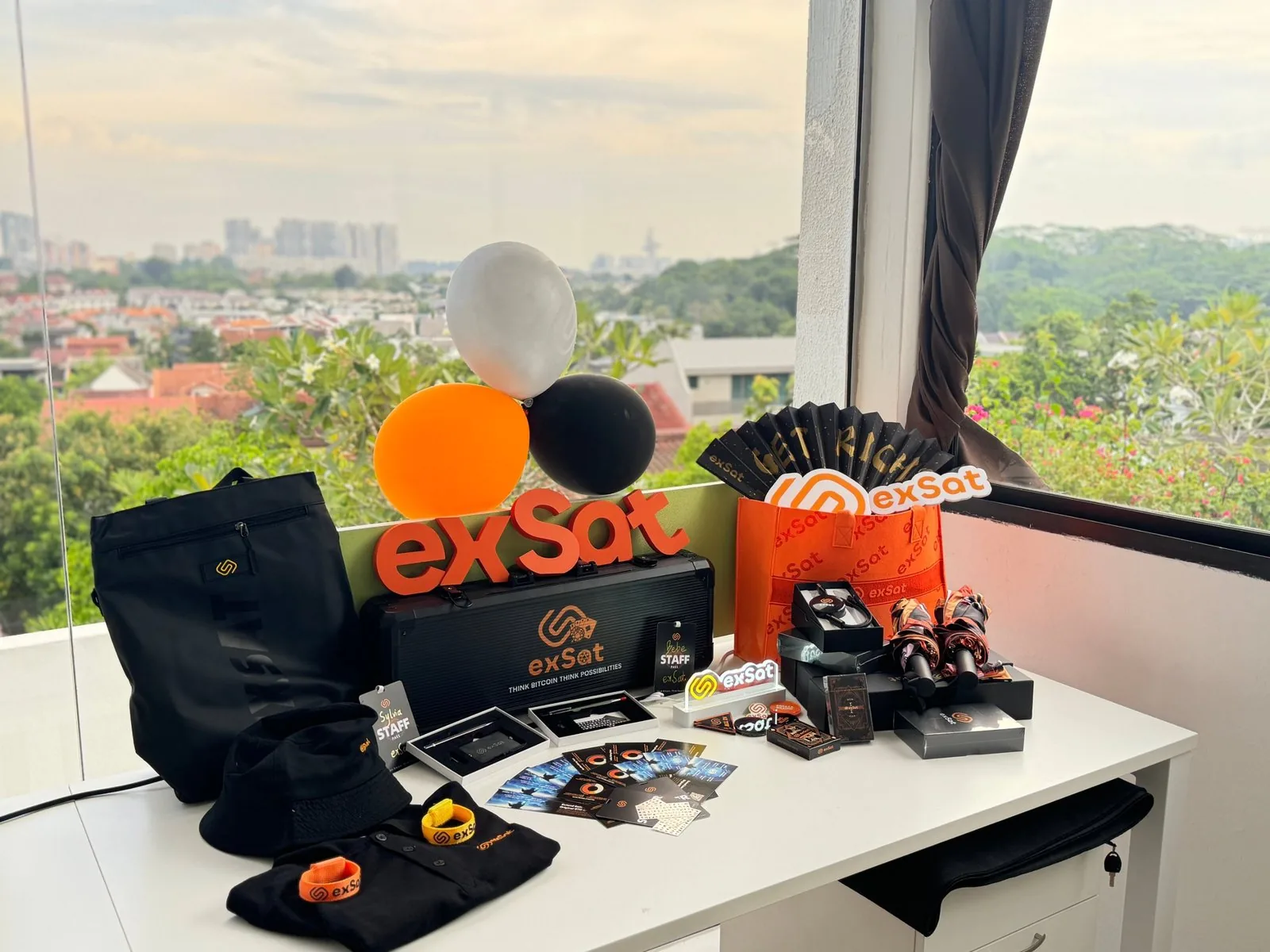 exSat branded merch and event kit